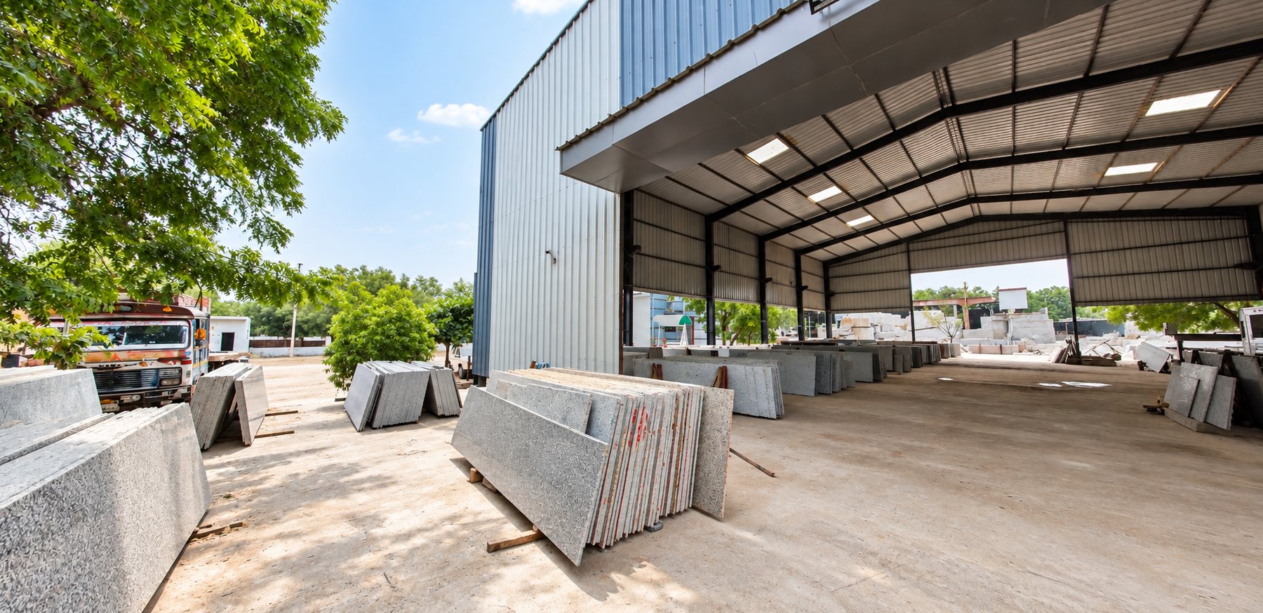 Finished granite slabs stacked outside the Asian Granites processing shed